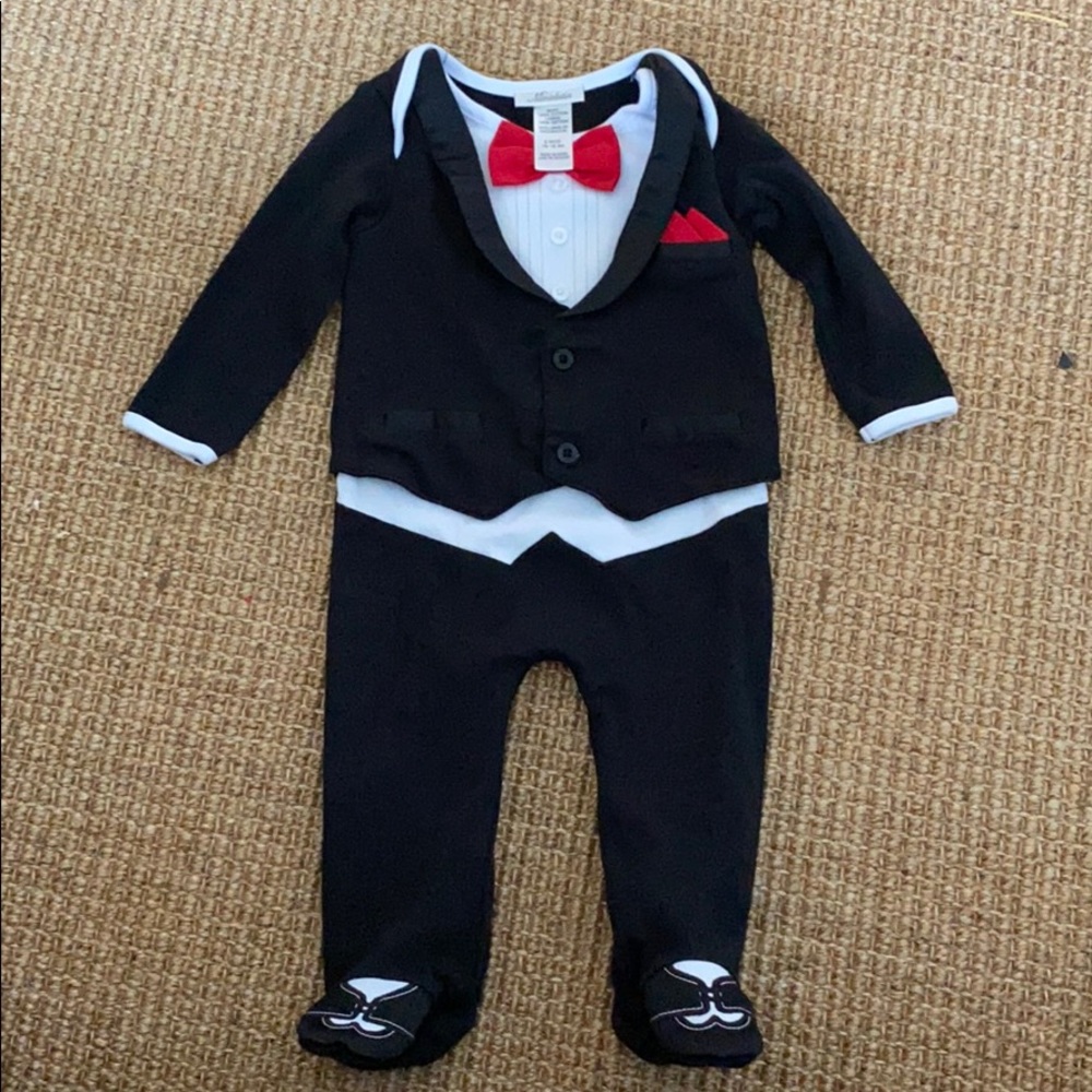 Miniclasix tuxedo footed onesie in 9 months.
